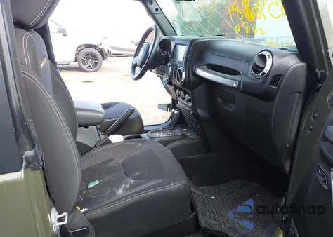 2015 Jeep Wrangler Sahara z USA, uszkodzony, nr VIN 1C4AJWBG6FL694473